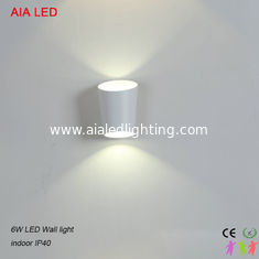 China 6W contemporary special design UP and DOWN way COB LED wall light for hotel rooms supplier